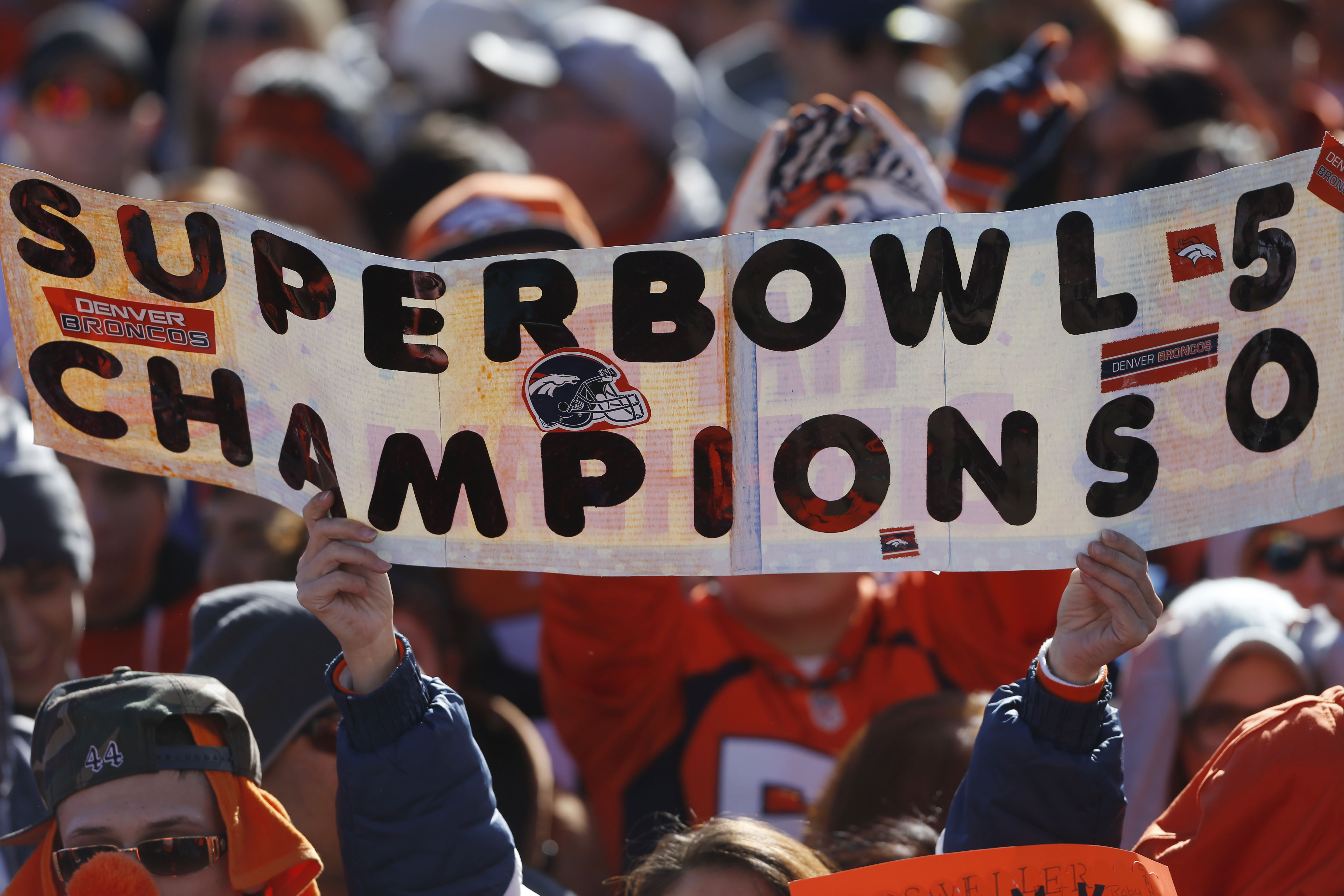 Super Bowl champion Broncos parade through Denver