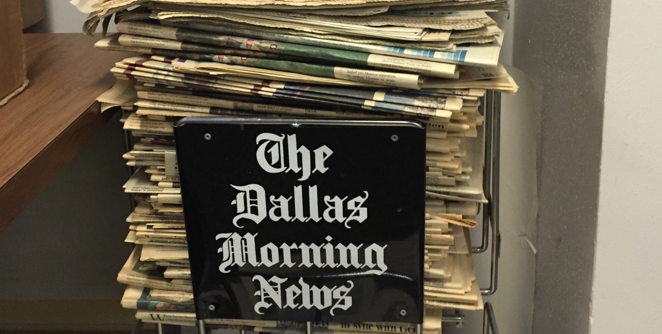 A pile of print at The Dallas Morning News. (Photo by Kristen Hare/Poynter)