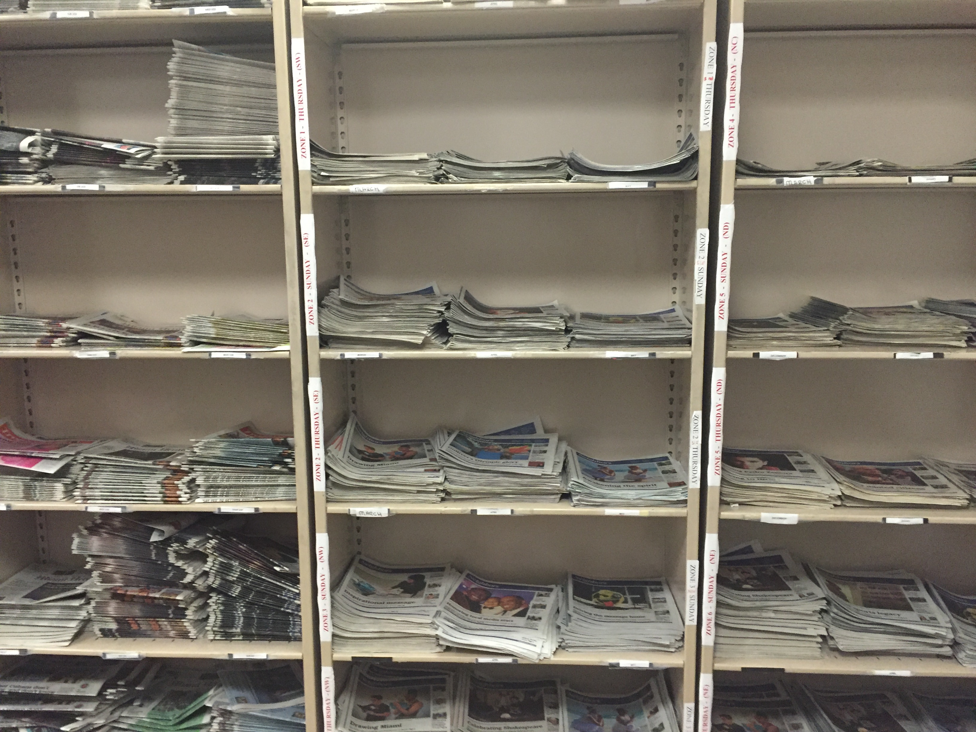 Archive papers from the Miami Herald. (Photo by Kristen Hare/Poynter)