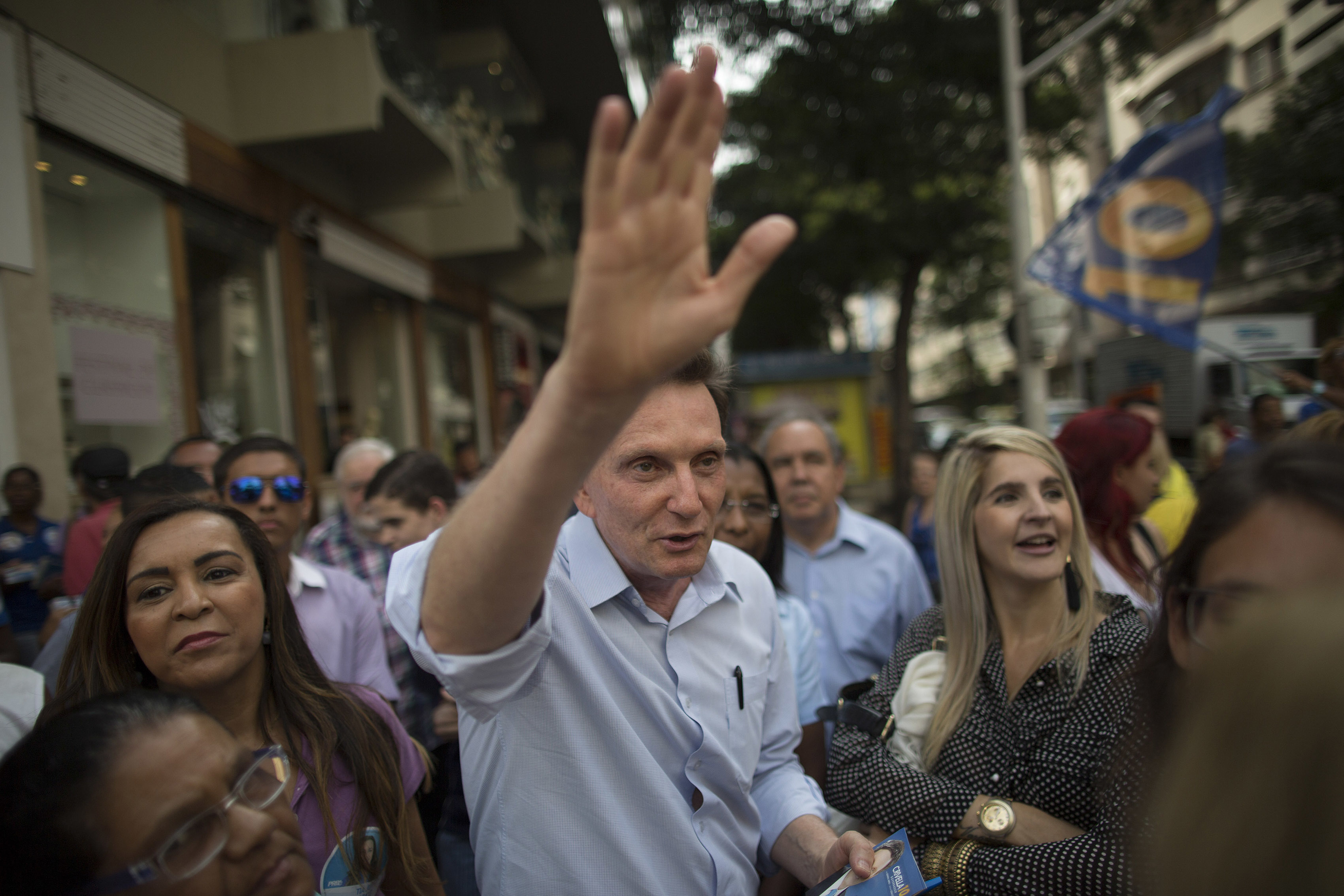 FILE - In this Sept. 29, 2014 file photo, Marcelo Crivella, bishop of the Universal Church of the Kingdom of God, campaigns in Copacabana, Rio de Janeiro, Brazil. (AP Photo/Leo Correa, File)