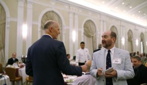 (Craig Pittman, right, talks with Florida Governor Rick Scott. Photo by Atoyia Deans/Tampa Bay Times)