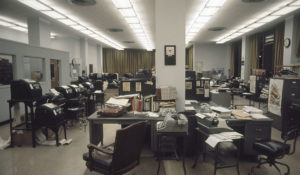 This is a general view of the Associated Press Washington D.C. bureau during a quiet night shift, with teletype machines at left, 1972.  (AP Photo)