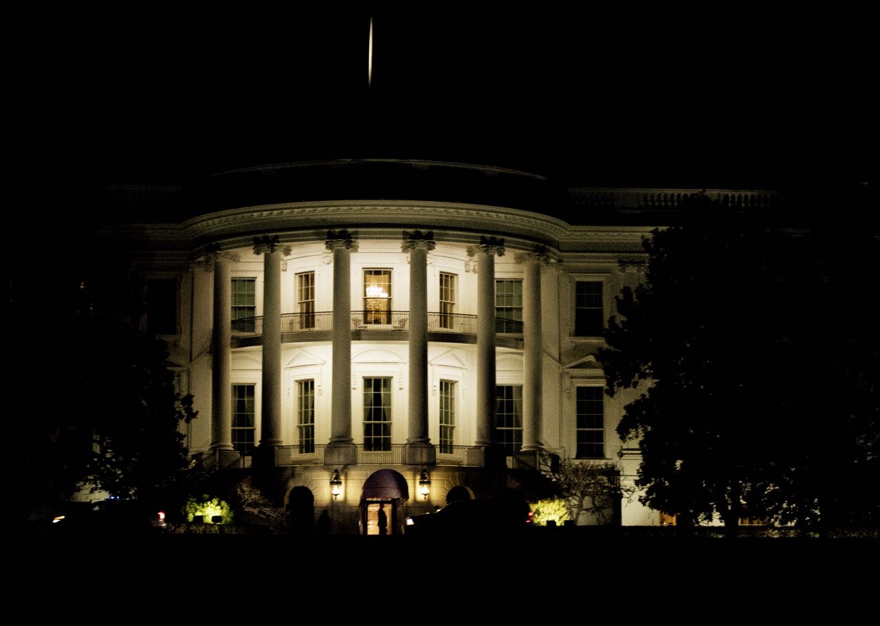 The White House in Washington late Saturday, Feb. 25, 2017, as President Donald Trump returns from a dinner with daughter Ivanka Trump and her husband White House adviser Jared Kushner at Trump International Hotel.  (AP Photo/Manuel Balce Ceneta)