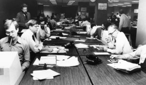 This was the scene in the newsroom of The New York Times, in New York City on Sunday, Nov. 5, 1978 as editorial staffs worked feverishly to prepare a edition on Monday. Staffs reported to work after the papers reached tentative agreements with all striking unions. (AP Photo/Ron Frehm )