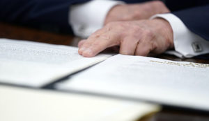 President Donald Trump speaks before signing an executive order aimed at curbing protections for social media giants, in the Oval Office of the White House, Thursday, May 28, 2020, in Washington. (AP Photo/Evan Vucci)