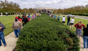 Hundreds wait in line for early voting Sept. 18 in Fairfax, Virginia. Misinformation about candidates and election issues is prevalent, so this week's newsletter offers some tools you can use in the classroom to educate students. (AP Photo/Andrew Harnik)