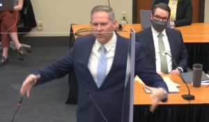 In this image from video, prosecutor Steve Schleicher gives closing arguments while defense attorney Eric Nelson, right, listens in the trial of former Minneapolis police Officer Derek Chauvin in Minneapolis. (Court TV via AP, Pool)