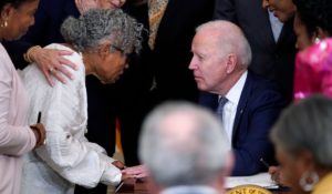 President Joe Biden speaks with Opal Lee after he signed the Juneteenth National Independence Day Act on Thursday. (AP Photo/Evan Vucci)