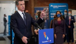 Gov. Gavin Newsom speaks at a news conference regarding COVID in Oakland, California on Monday. (AP Photo/Jeff Chiu)