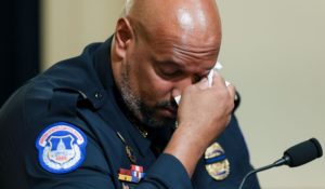 U.S. Capitol Police Sgt. Harry Dunn wipes his eye as he testifies during the House select committee hearing on the Jan. 6 attack on Capitol Hill in Washington on Tuesday. (Oliver Contreras/The New York Times via AP, Pool)