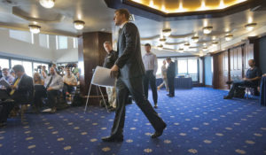 James O'Keefe, President of Project Veritas Action, walls to the podium to speak at a news conference at the National Press Club in Washington, Tuesday, Sept. 1, 2015. (AP Photo/Pablo Martinez Monsivais)