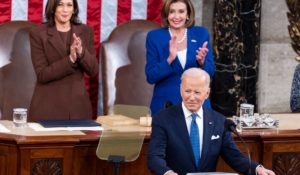 President Joe Biden, with Vice President Kamala Harris and House Speaker Nancy Pelosi, delivering his State of the Union address on Tuesday night. (Jim Lo Scalzo/Pool via AP)