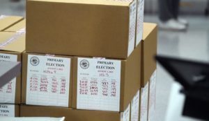 Boxes of ballots sit in the Maricopa County Recorder and Elections Department offices after Arizona's primary election Wednesday, Aug. 3, 2022, in Phoenix. (AP Photo/Ross D. Franklin)