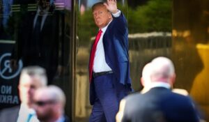 Former President Donald Trump arrives at Trump Tower in New York on Monday. He is expected to be arraigned today on charges arising from hush money payments during his 2016 campaign. (AP Photo/Bryan Woolston)