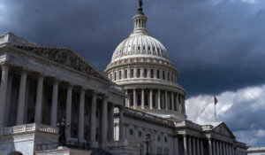 The Capitol is seen under dark clouds in Washington, Tuesday, Sept. 12, 2023. Earlier in the day, Speaker of the House Kevin McCarthy, R-Calif., announced to reporters that he is directing a House committee to open a formal impeachment inquiry into President Joe Biden. (AP Photo/J. Scott Applewhite)