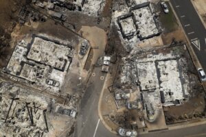 Charred cars and buildings are visible in the aftermath of a wildfire in Lahaina, Hawaii, Aug. 22, 2023.  (AP Photo/Jae C. Hong, File)