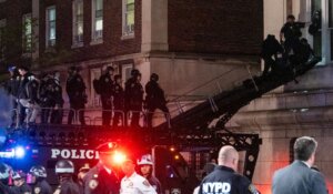 Using a tactical vehicle, New York City police enter an upper floor of Hamilton Hall on the Columbia University campus in New York on Tuesday. (AP Photo/Craig Ruttle)