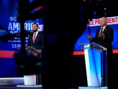 Democratic vice presidential nominee Minnesota Gov. Tim Walz speaks during a vice presidential debate hosted by CBS News, with Republican vice presidential nominee Sen. JD Vance, R-Ohio, Tuesday, Oct. 1, 2024, in New York. (AP Photo/Matt Rourke)