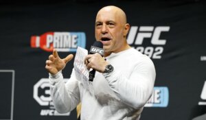 Podcaster Joe Rogan, shown here at a UFC event in 2023. (AP Photo/Gregory Payan)