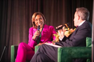 “Good Morning America” co-anchor Robin Roberts speaks to Poynter president Neil Brown after accepting the Poynter Medal for Lifetime Achievement in Journalism, which honors accomplished journalists who have significantly impacted the profession, at the institute's Bowtie Ball in Tampa, Florida, on Nov. 16, 2024. (Chris Zuppa/Poynter)