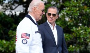 President Joe Biden, along with his son, Hunter, in July of this year. (AP Photo/Susan Walsh)