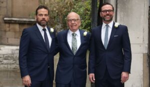 Rupert Murdoch, center, next to his sons, Lachlan (left), and James in 2016. (Joel Ryan/Invision/AP)